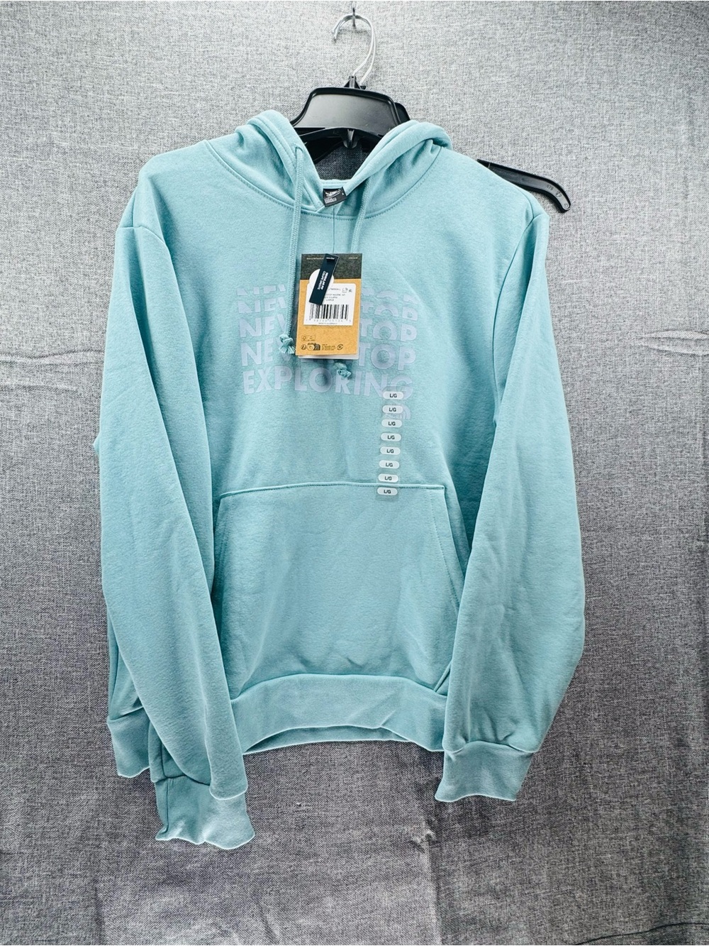 Light Teal Woman’s North face Hoodie Sweatshirt - Brand Not Visible